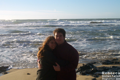 Cuddling at Half Moon Bay on the Pacific because it was cold!